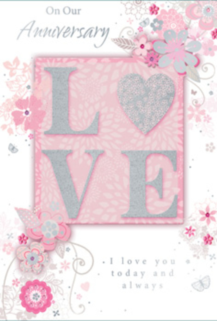 This anniversary card looks like it could have been composed at a small florist's table in Upper Clapton, where a love of flowers and paper art come together. On the front, the main motif is the word LOVE, placed centrally in tall, raised letters that have been carefully coated with a fine, sparkling layer of blush-pink, creamy white, and silvery glitter. The effect is gently luminous rather than harsh, with each letter catching the light in a way that suggests frosted petals on a cool morning. The texture is unmistakably tactile-smooth card interrupted by lightly rough, glittered ridges that invite a hand to trace them slowly. The background behind these letters is a soft, diffused pink, subtly shaded to create a sense of depth, like the sky just after sunrise seen from the quiet streets near Clapton Common. Around the central word, a delicate array of illustrated blooms unfurls. The flowers are stylised yet romantic, their petals outlined in fine grey and softened with washes of blush, lilac, and pearly white. These blooms are interlaced with slender leaves and swirling stems, forming a loose, organic frame that feels akin to the way a florist might let greenery and blossoms spill naturally from an anniversary arrangement. Fine filigree lines twist into airy curls, and here and there, tiny butterflies and almost-hidden petals offer small details to discover, echoing the layered textures of a hand-tied bouquet. Inside, scripted text reads On Our Anniversary and I love you today and always, set in an understated but elegant font that leaves plenty of open space, allowing the sentiment to breathe. The entire card conveys a gentle, enduring warmth, perfect for celebrating another year of partnership in an Upper Clapton home, perhaps placed beside fresh stems delivered by Flowers Upper Clapton.