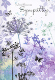 This card carries a gentle visual poem of wildflowers and butterflies, perfectly suited to the reflective moments that follow a loss in Upper Clapton. Airy silhouettes of tall, umbelliferous blooms rise from the lower edge, their slender stems sketched in soft greys and muted greens. Above them, the intricate heads of tiny flowers unfold in graceful shades of lavender, indigo, and pale blue, each cluster appearing almost lace-like against the background. The scene is bathed in a cool, calming palette where watercolour washes of violet and silvery green blend as seamlessly as distant clouds over the Lea Valley at dusk. Petals seem to drift into the surrounding colour, creating a sense of movement that is subtle yet ever-present. A few butterflies hover among the stems, their wings rendered with minimal lines and feather-light transparency, evoking transformation, remembrance, and the quiet presence of those no longer seen. The light remains soft and diffuse throughout, wrapping the illustration in a comforting hush rather than bright glare. Space between each stem and bloom allows the image to feel open, inviting a slow, thoughtful gaze rather than demanding attention. At Flowers Upper Clapton, we recognise in this design the same quiet grace we aim for in our sympathy and funeral arrangements: a balance of beauty and restraint that supports, rather than overshadows, heartfelt words. This card provides a respectful, nature-woven setting for conveying sincere condolences to friends, neighbours, or family within the local community and beyond.